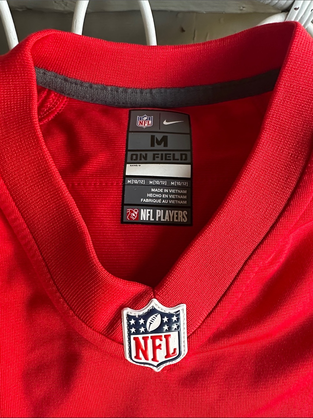 Nike Brady Kids Red Football Jersey with White #12 and Blue Trim - Picture 3 of 5